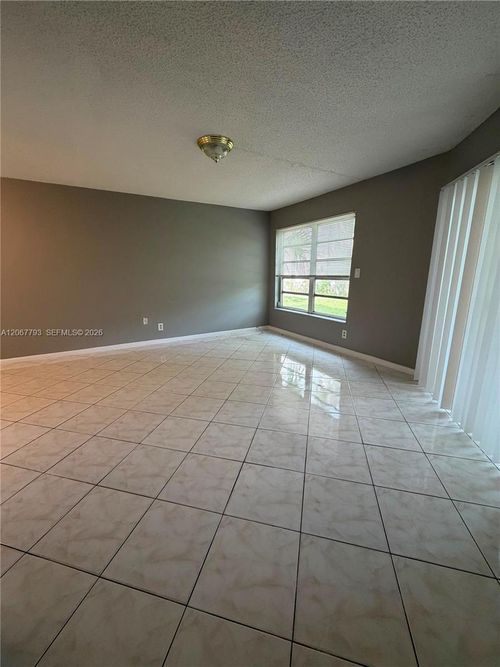 104-3100 Riverside Dr, Coral Springs, FL, 33065-1011 | Card Image