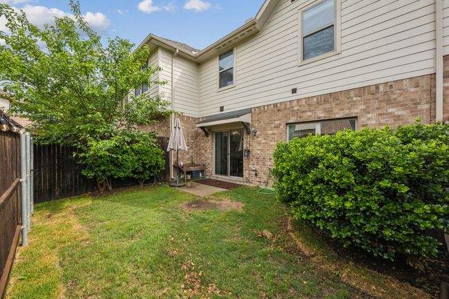 View of yard featuring a fenced backyard | Image 24