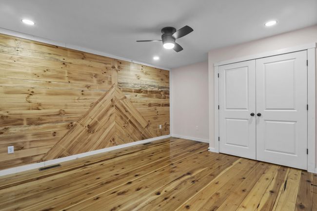 Master Bedroom on Main Floor has accent wall | Image 13