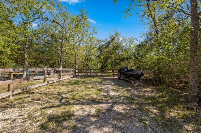 View of yard with fence | Image 18