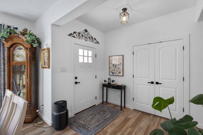 Entrance foyer with light wood-style flooring and baseboards | Image 5