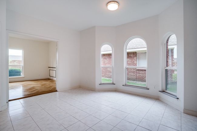 Empty room with baseboards | Image 16