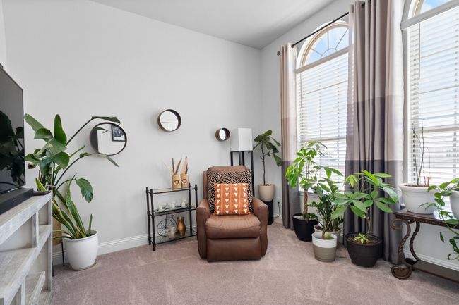 Bright and spacious guest room with oversized windows and luxurious carpeting! | Image 23