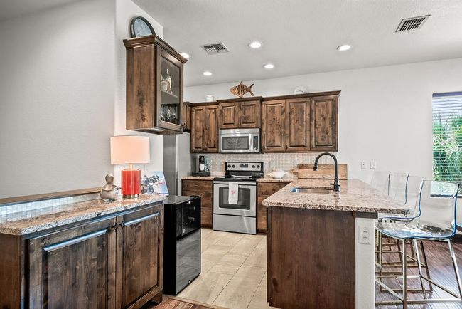 Bonus counter/cabinet space, perfect for a coffee or liquor bar! | Image 18
