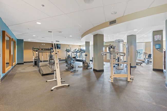 Exercise room, only about 50 steps from unit, very convenient. Indoor pool/jacuzzi and spa adjacent, restaurant above. | Image 22