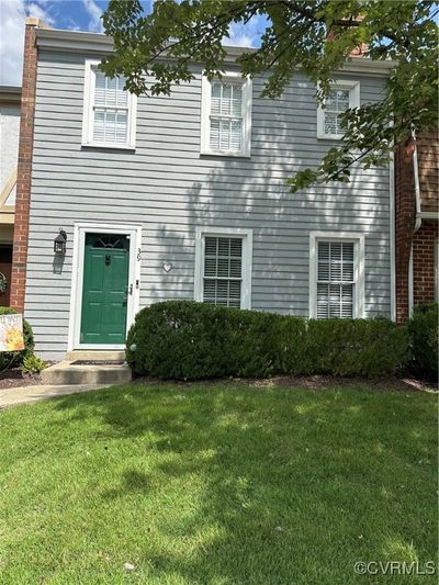 View of front of home featuring a front lawn | Image 1