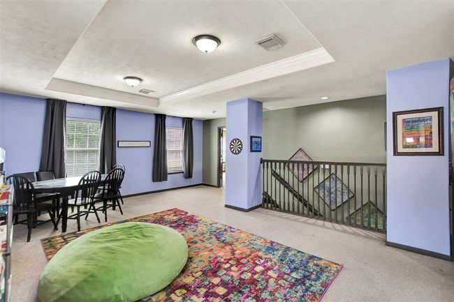 Spacious and inviting game room up. Ideal for family fun and relaxation. | Image 30