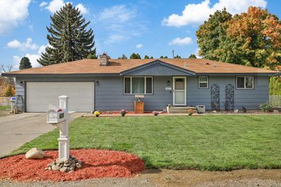 607 N Long Rd, Home with 4 bedrooms, 2 bathrooms and null parking in Spokane Valley WA | Image 1