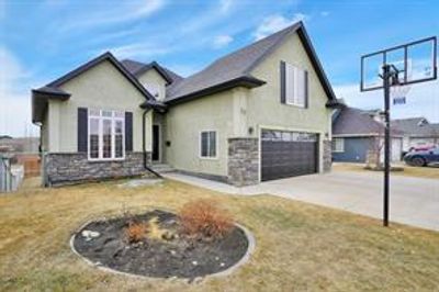 22 Emily Cres, House detached with 5 bedrooms, 3 bathrooms and 2 parking in Lacombe AB | Image 2