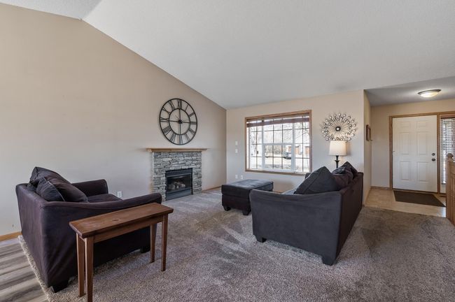 Gas fireplace with stone surround is perfect for cold nights. | Image 6