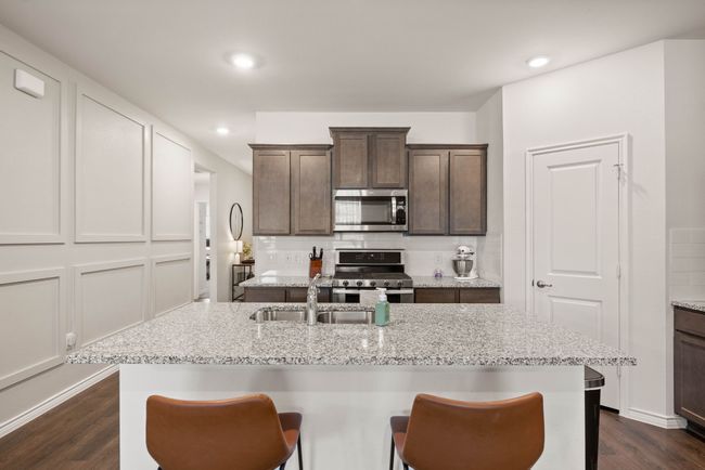 Kitchen with breakfast bar island | Image 9