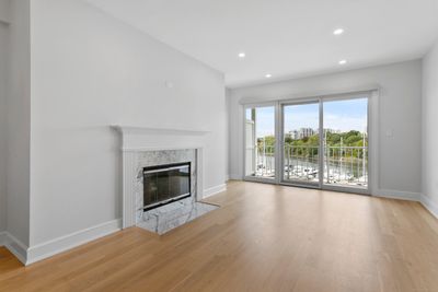 Living Room with harbor view and sliding doors to balcony.... | Image 3