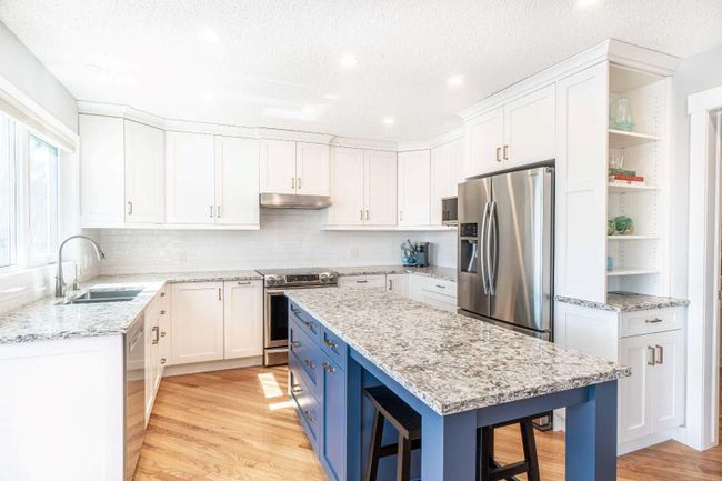 59 Schooner Close Nw, Home with 4 bedrooms, 3 bathrooms and 4 parking in Calgary AB | Image 6