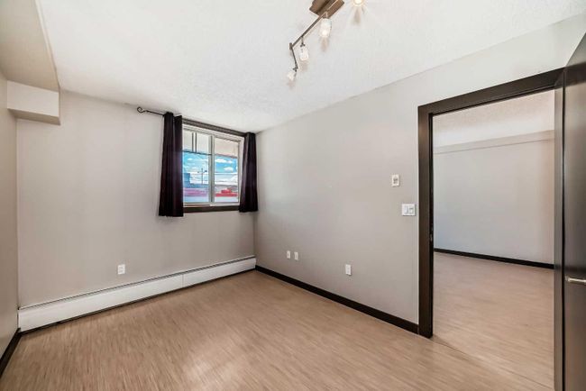 209 - 1301 17 Avenue Nw, Home with 1 bedrooms, 1 bathrooms and 1 parking in Calgary AB | Image 12