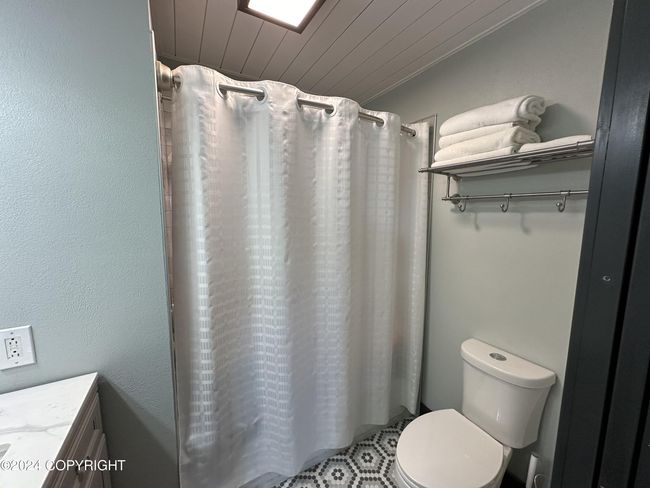 Upstairs full bathroom | Image 32