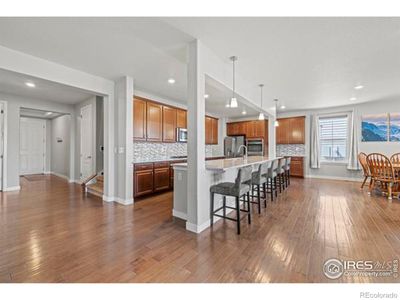 main floor kitchen with 14 foot bar | Image 2