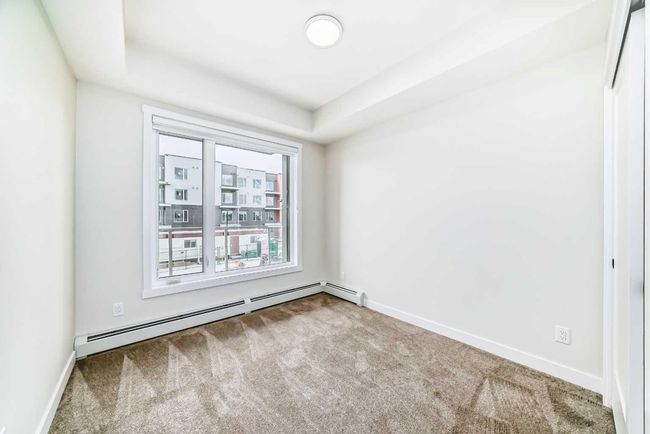 212 - 660 Shawnee Square Sw, Condo with 2 bedrooms, 2 bathrooms and 1 parking in Calgary AB | Image 15
