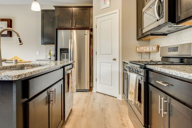 11539 Parkside Lane N, Townhouse with 4 bedrooms, 3 bathrooms and null parking in Champlin MN | Image 7