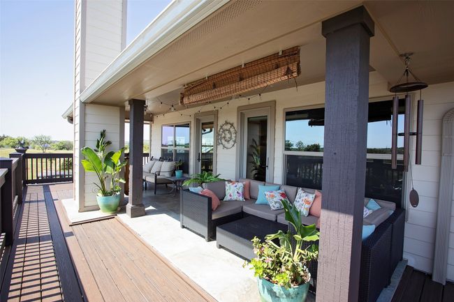 Wooden terrace with outdoor lounge area | Image 4
