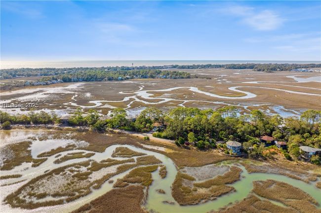 Hightide water view in front of home beyond the berm. | Image 62