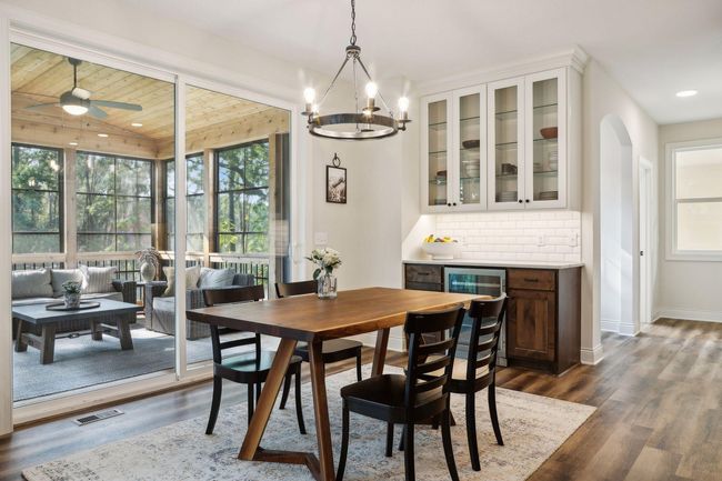 Informal Dining Room with a Breakfast Bar and Hutch | Image 11