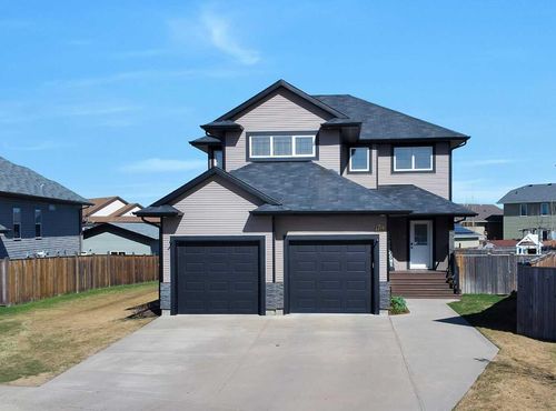4419 58 Street Close, Home with 4 bedrooms, 3 bathrooms and 4 parking in Rocky Mountain House AB | Card Image