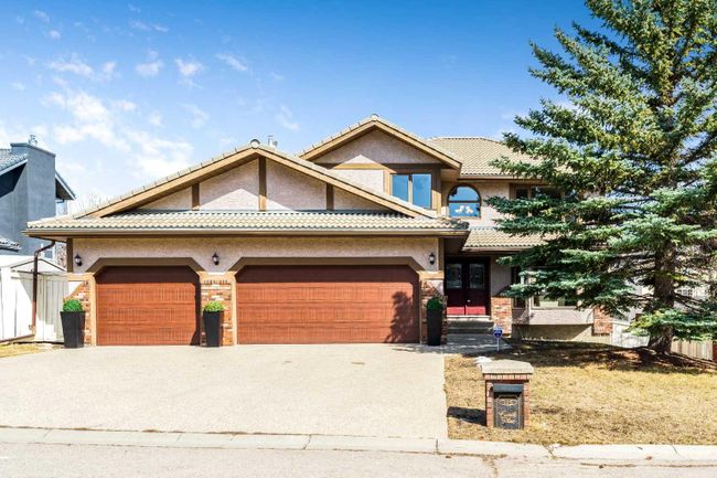 105 Candle Place Sw, Home with 4 bedrooms, 3 bathrooms and 6 parking in Calgary AB | Image 1