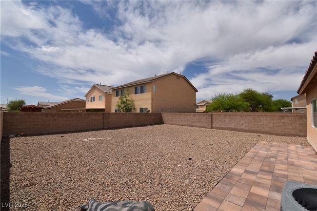 View of yard with a fenced backyard and cooling unit | Image 24