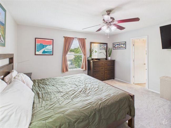 Bedroom featuring carpet floors and a ceiling fan | Image 11