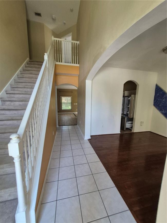 staircase with formal dining/office | Image 21