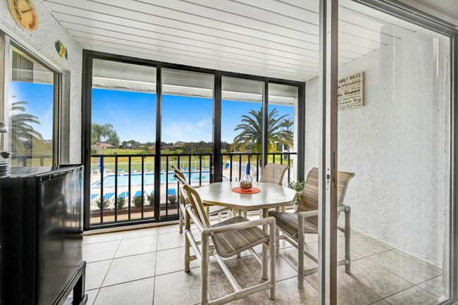 Living Rm with Beautiful Pool View! | Image 7