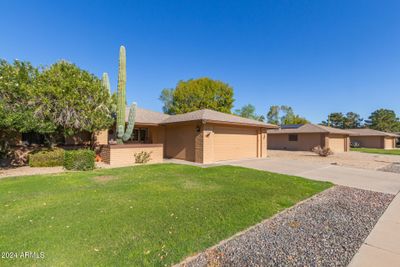 12828 W Peach Blossom Drive, Home with 2 bedrooms, 2 bathrooms and null parking in Sun City West AZ | Image 2