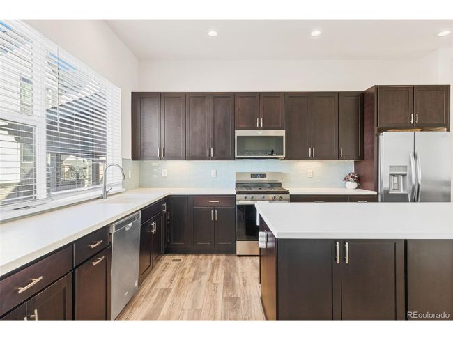 5173 Vivian St, Townhouse with 4 bedrooms, 3 bathrooms and null parking in Wheat Ridge CO | Image 16