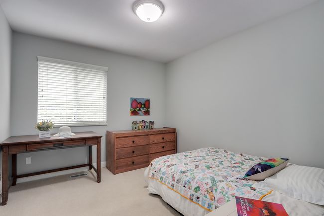 Bedroom with light colored carpet | Image 17