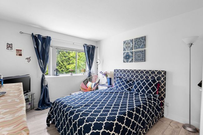 Bedroom featuring light wood-type flooring | Image 20