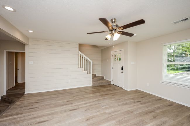 Entrance foyer with stairway, light wood-style floors, recessed lighting, and a ceiling fan | Image 12