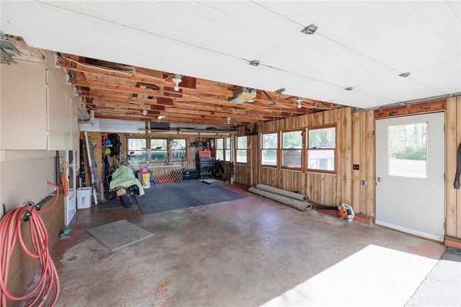 Attached 2 car deep garage | Image 31