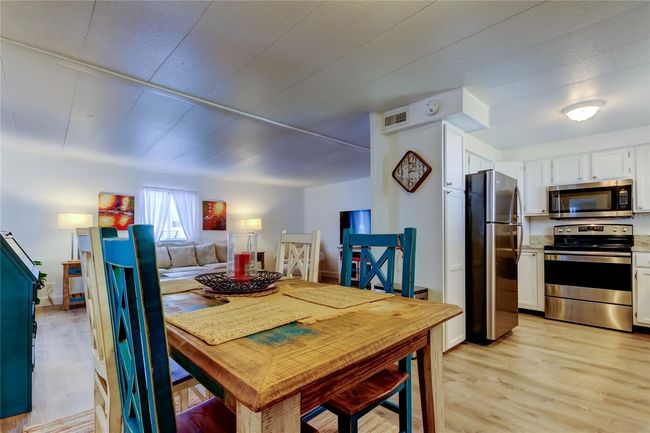 25. Dining Area (8' x 10') Flows Into Kitchen & Living Room.. True Open Concept! Be Part of the Action When Entertaining! 4-6 Seat Dinette! | Image 25