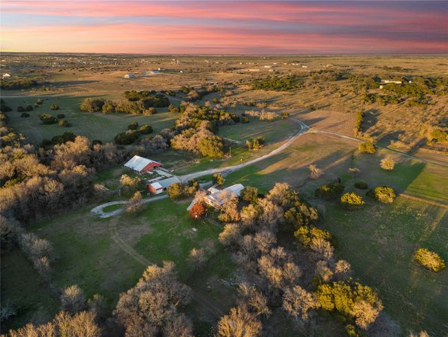 Aerial view of Guest House, barn, and carport | Image 35