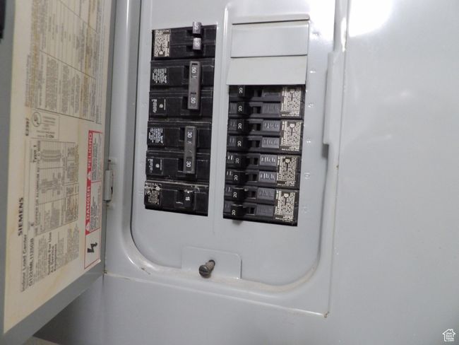 View of electrical panel in laundry room. | Image 38