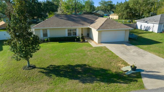 7 Fir Drive Trce, Condo with 3 bedrooms, 2 bathrooms and null parking in Ocala FL | Image 4