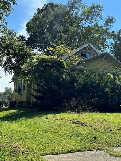 View of side of property featuring a lawn | Image 2