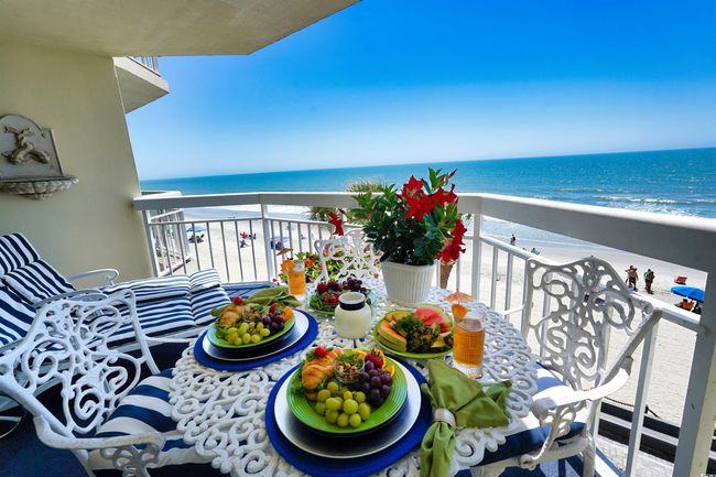 Balcony featuring view of water and beach | Image 30