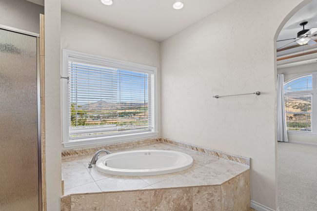Primary bath tub and view | Image 32