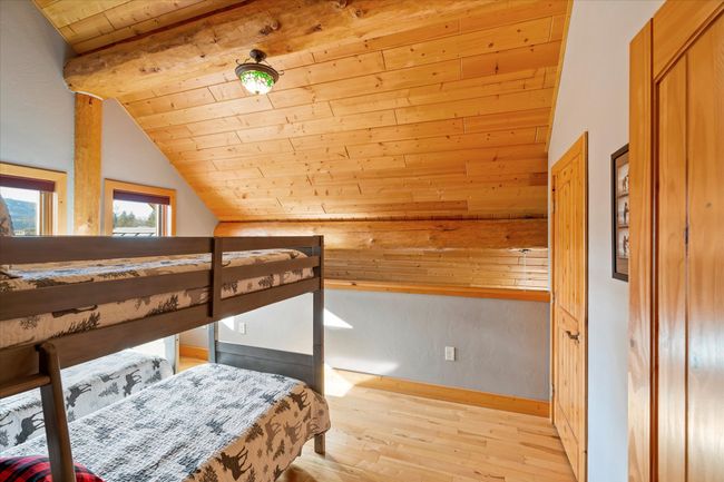 Upper level bunk room. | Image 56