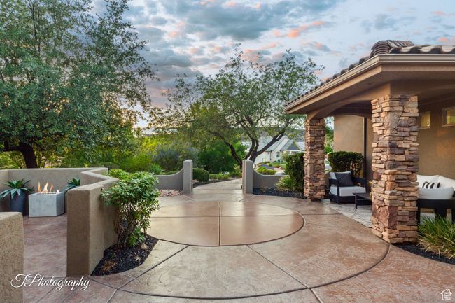 Patio terrace at dusk with a patio area and an outdoor hangout area | Image 8