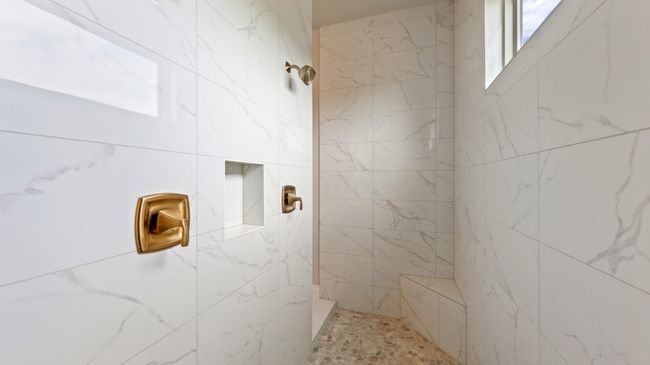 Full bathroom with a marble finish shower | Image 28