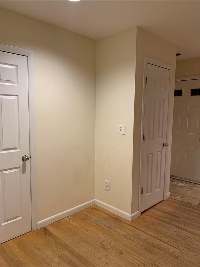 1st Fl Unfurnished room with light wood-type flooring | Image 21