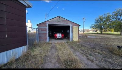 Big garage for 2 cars and still has a ton of extra storage space. | Image 3