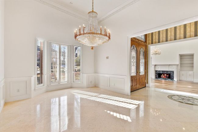 Enhanced Photo of the formal dining without wallpaper | Image 9